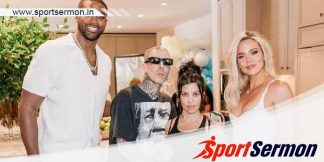 Tristan Thompson poses with Kourtney & Khloe Kardashian  