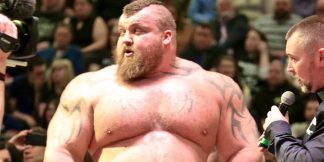 Former Strongman Hall Wins Bizarre MMA Debut in Brutal Fashion  