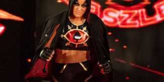 Shayna Baszler counters a WWE fan for his comments about tattoos  