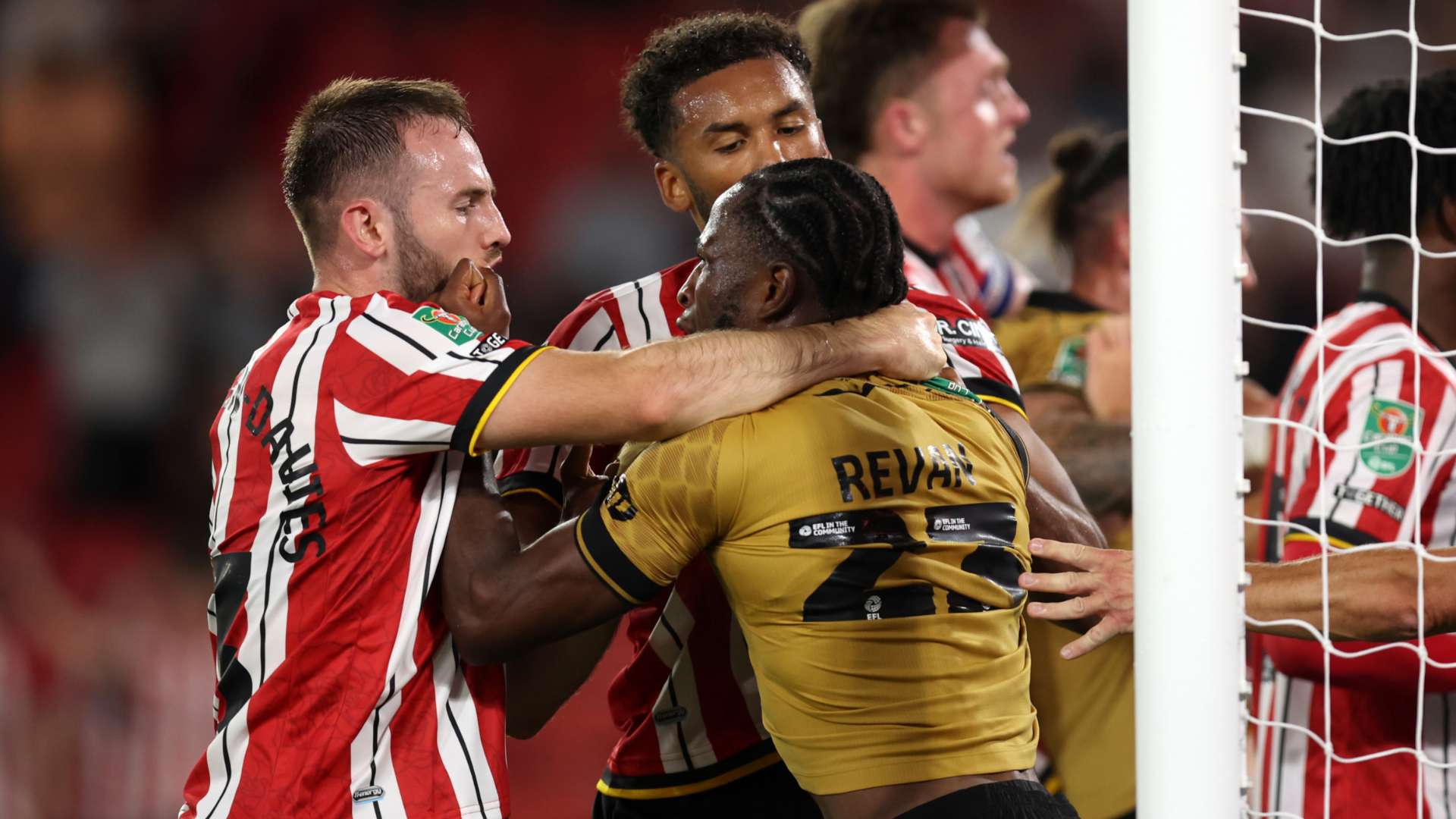 Wrexham's cup defeat to Sheff Utd ends in mass brawl  