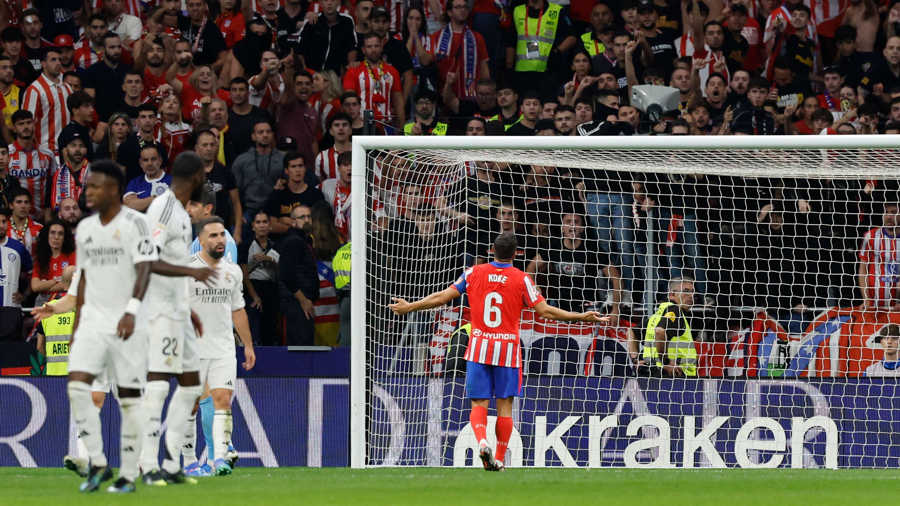 Madrid derby suspended amid chaotic scenes  