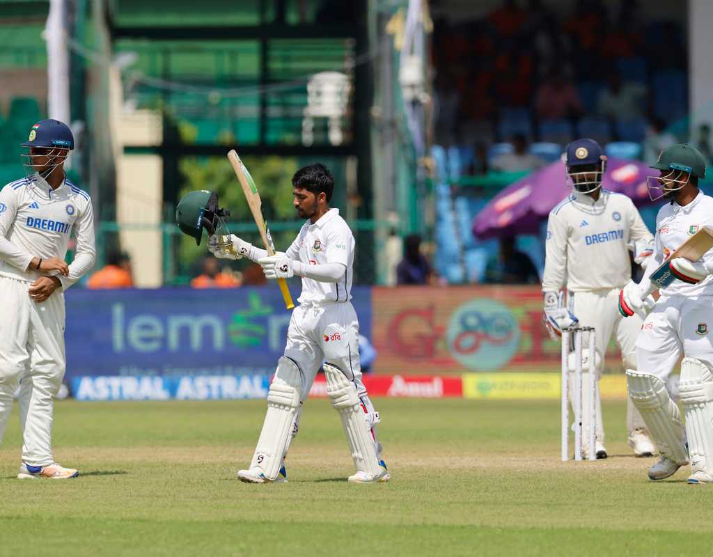 Bangladesh stay afloat through Mominul's hundred  
