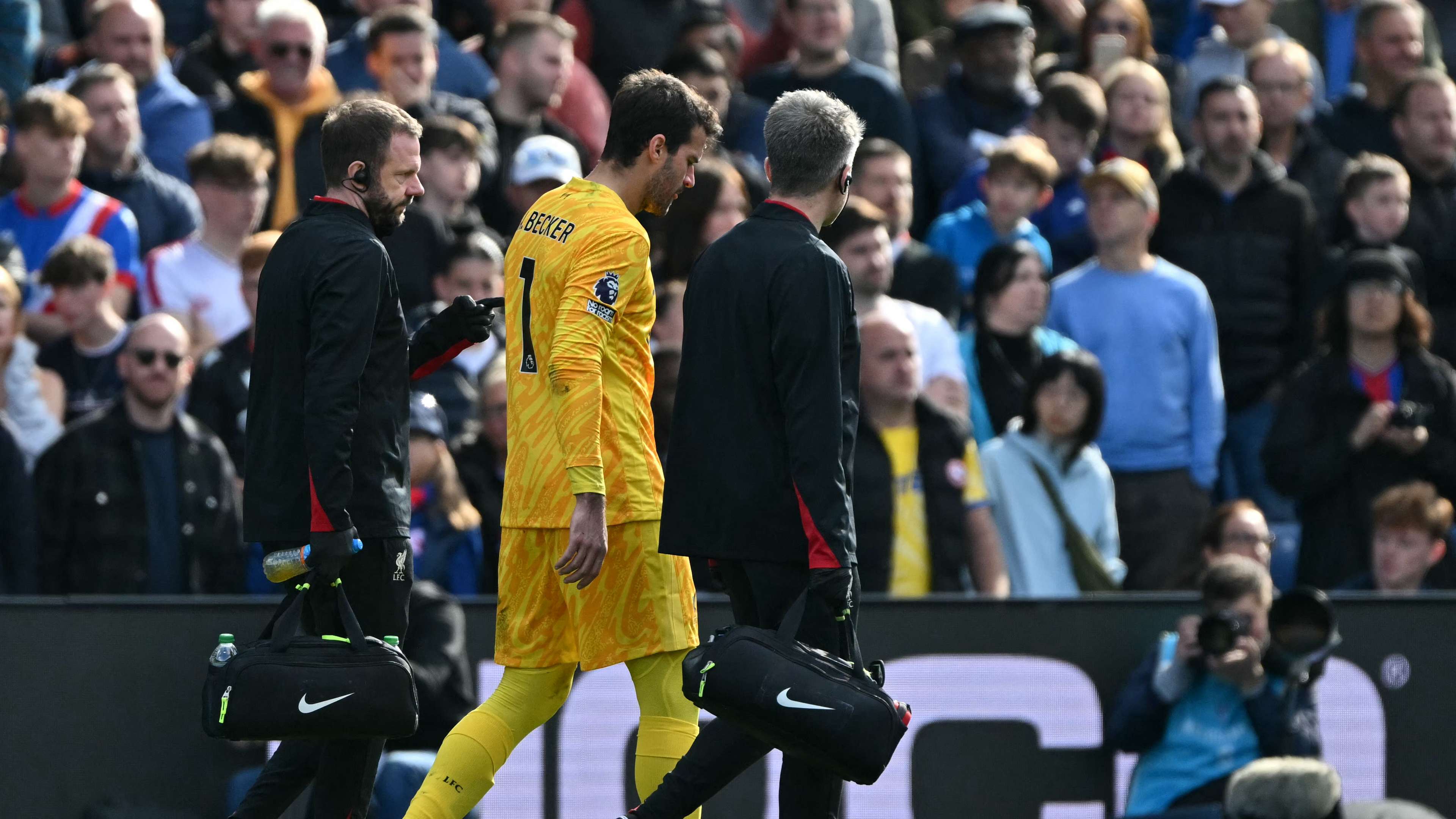 Alisson forced off injured against Crystal Palace  