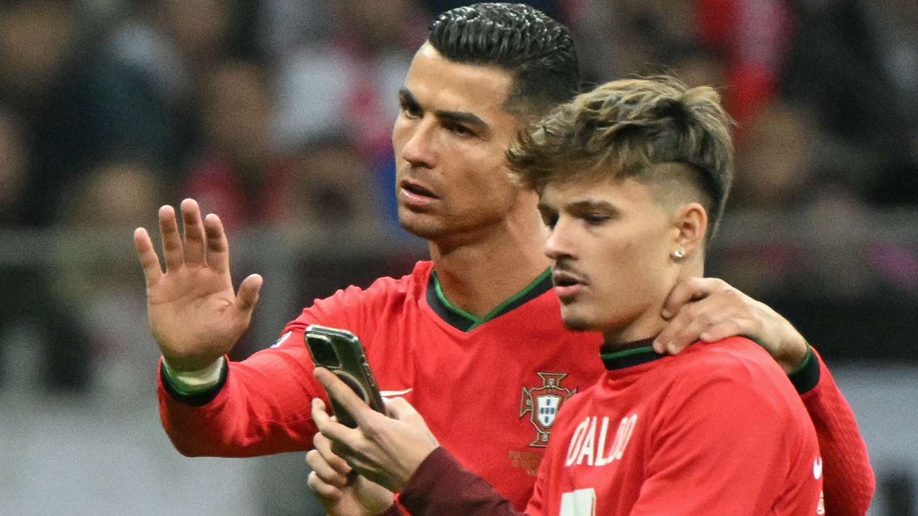 Ronaldo poses for selfie with pitch invader during Poland win   Ronaldo poses for selfie with pitch invader during Poland win