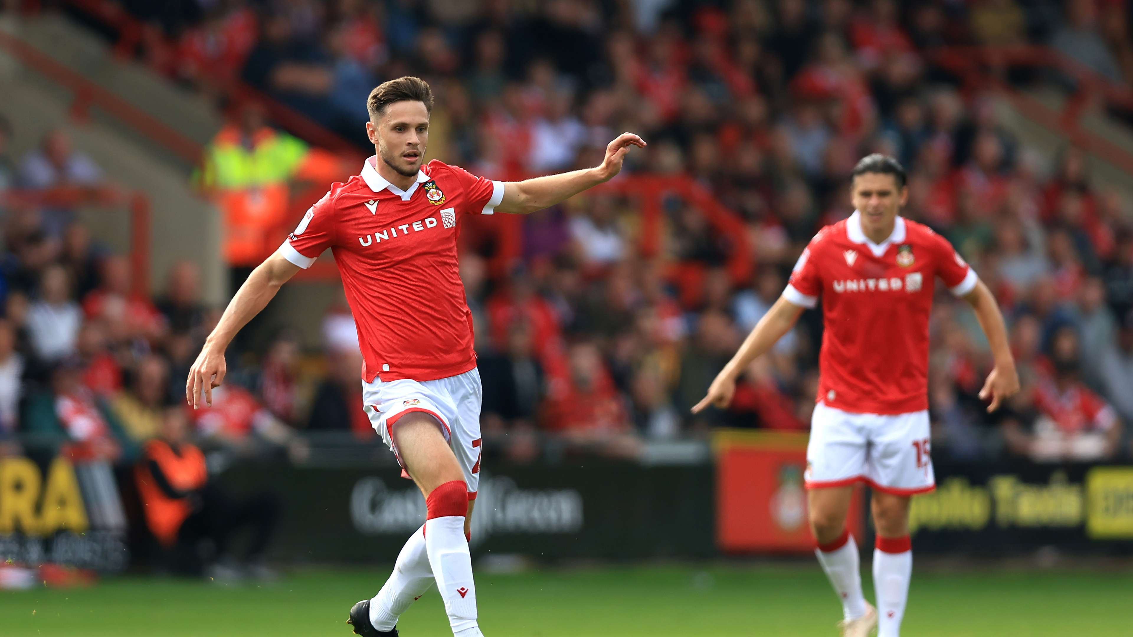 Barnett commits future to Wrexham as the Red Dragons continue promotion chase  