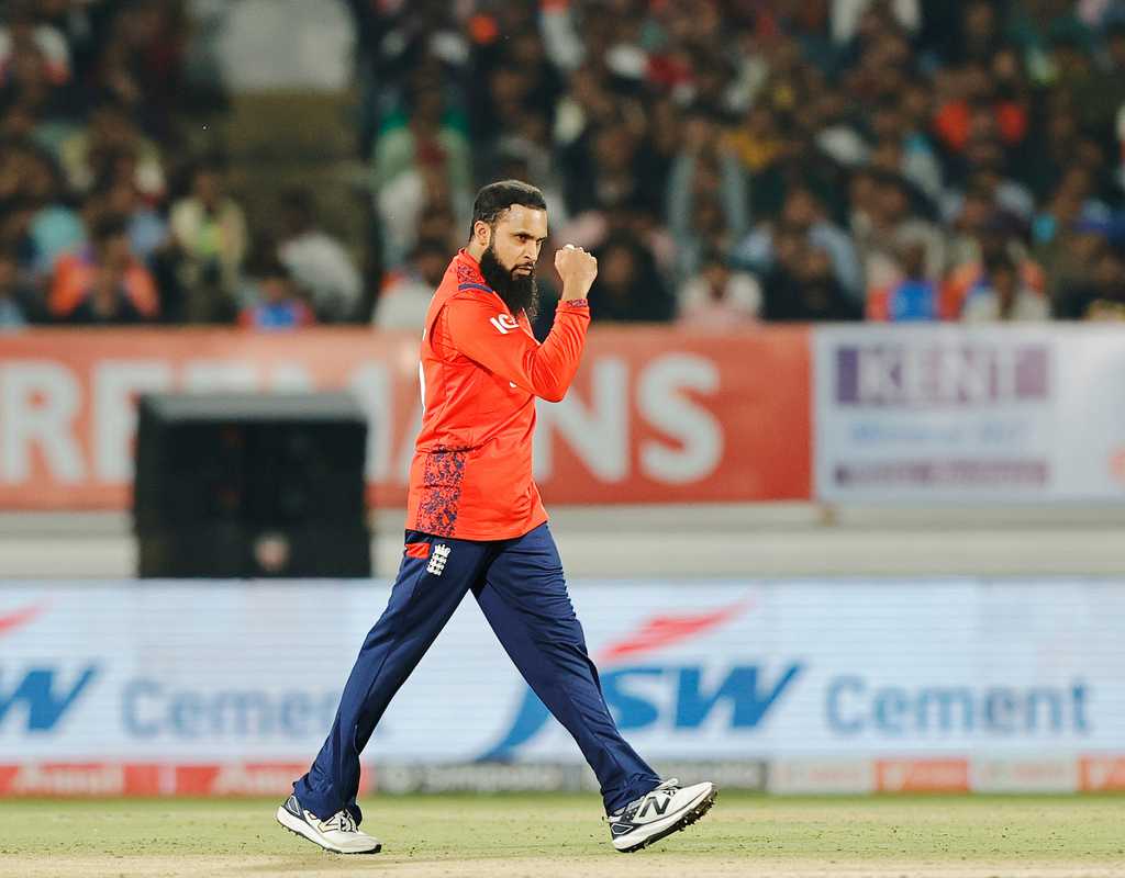 England live on with Adil Rashid's middle-overs squeeze  