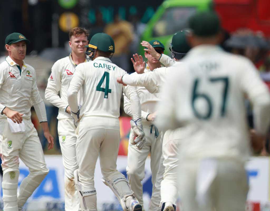 Australia tighten grip as Sri Lanka lose five  