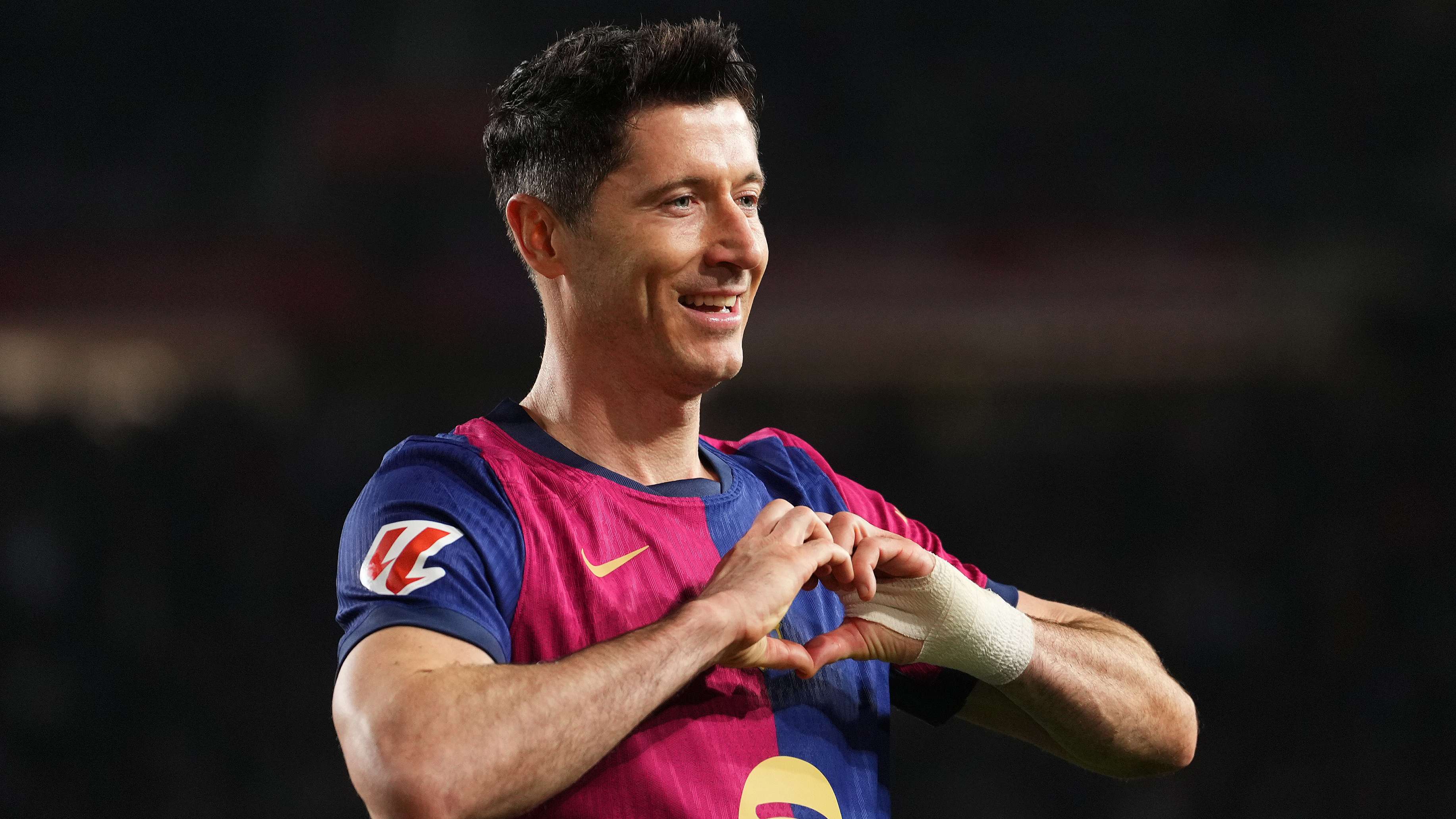 Lewandowski extends Barca contract after hitting milestone  