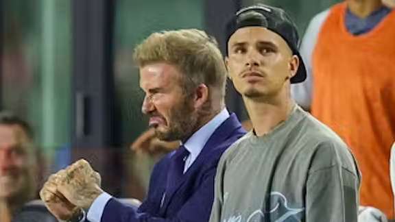 Beckham sends 'proud' message to son Romeo after Versace catwalk  