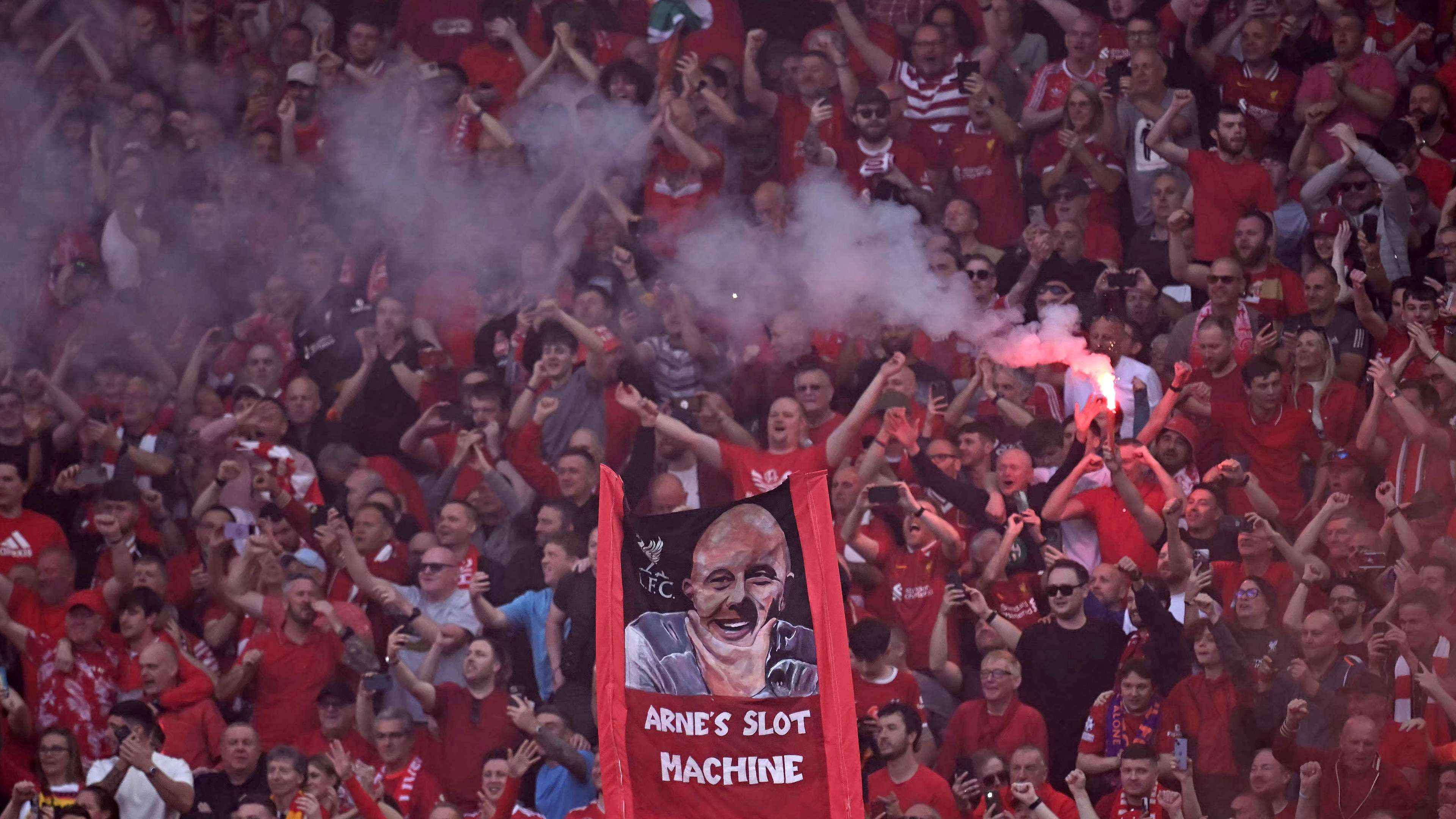 Liverpool fans let off blue flares in prank by Everton supporters  