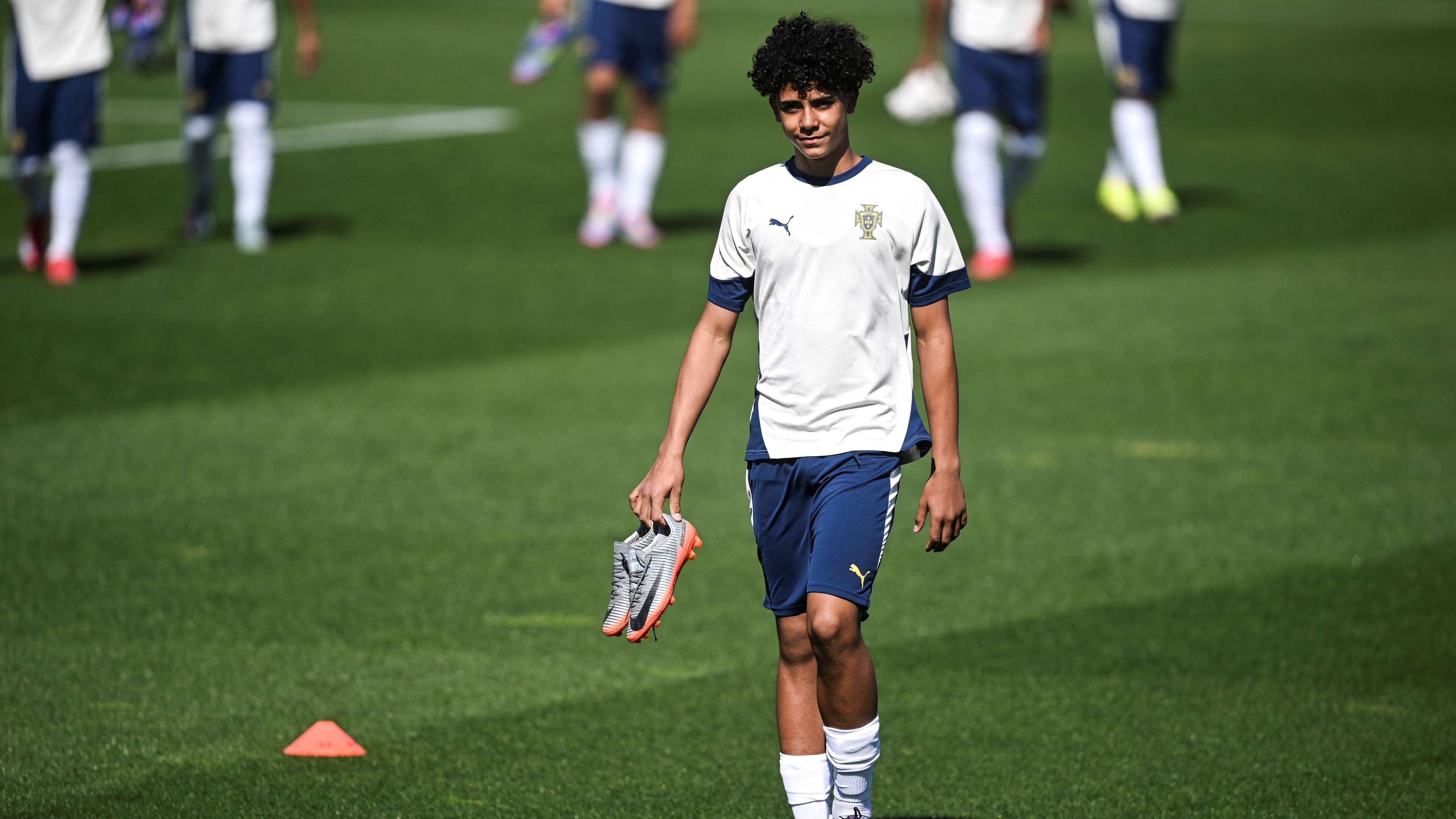 Ronaldo's son wears signature CR7 & Mbappe boots in Portugal training  