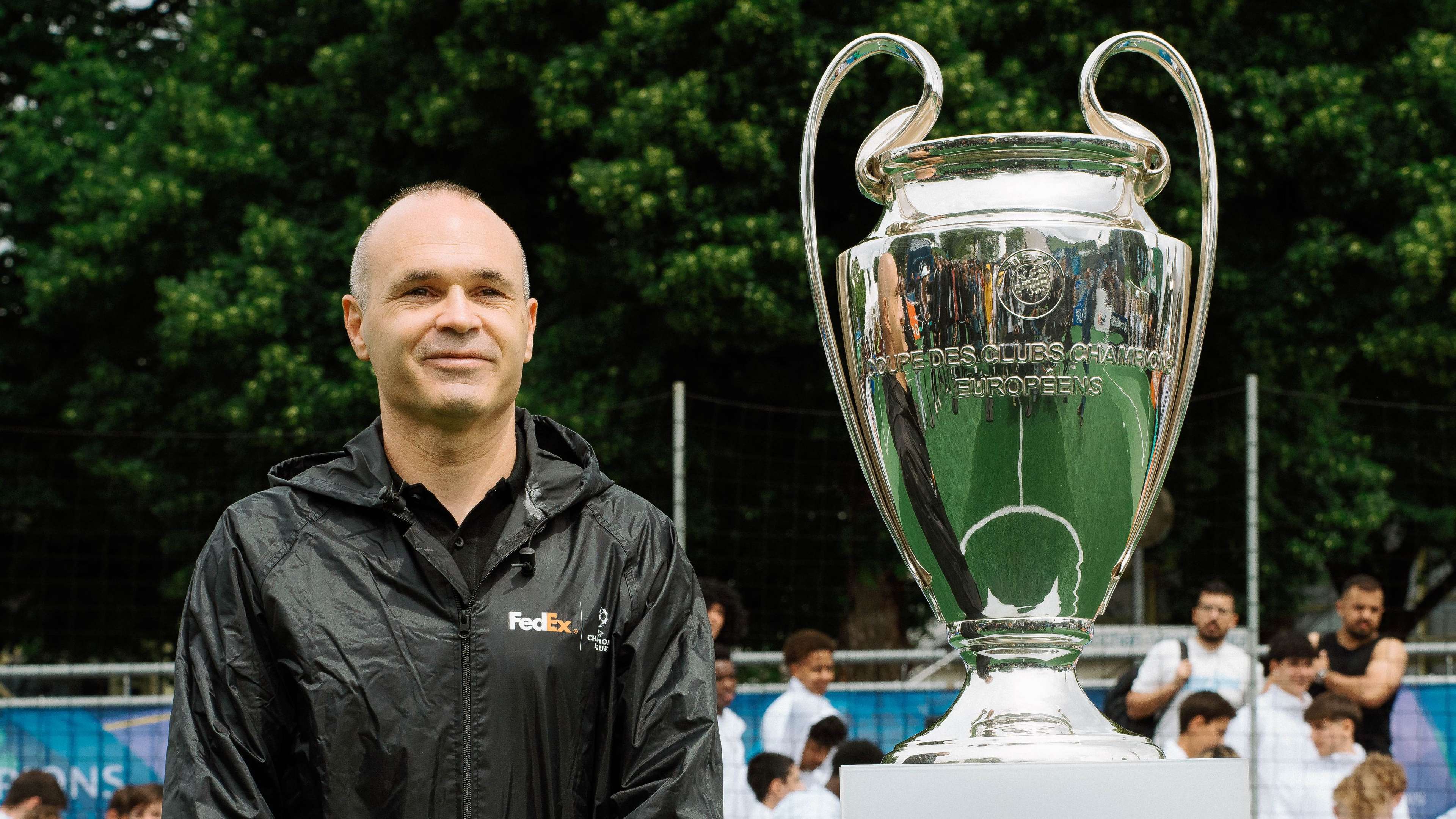 Iniesta teams up with FedEx to deliver Champions League trophy  