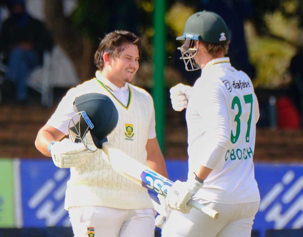 Twin tons help South Africa breach 400 on opening day  