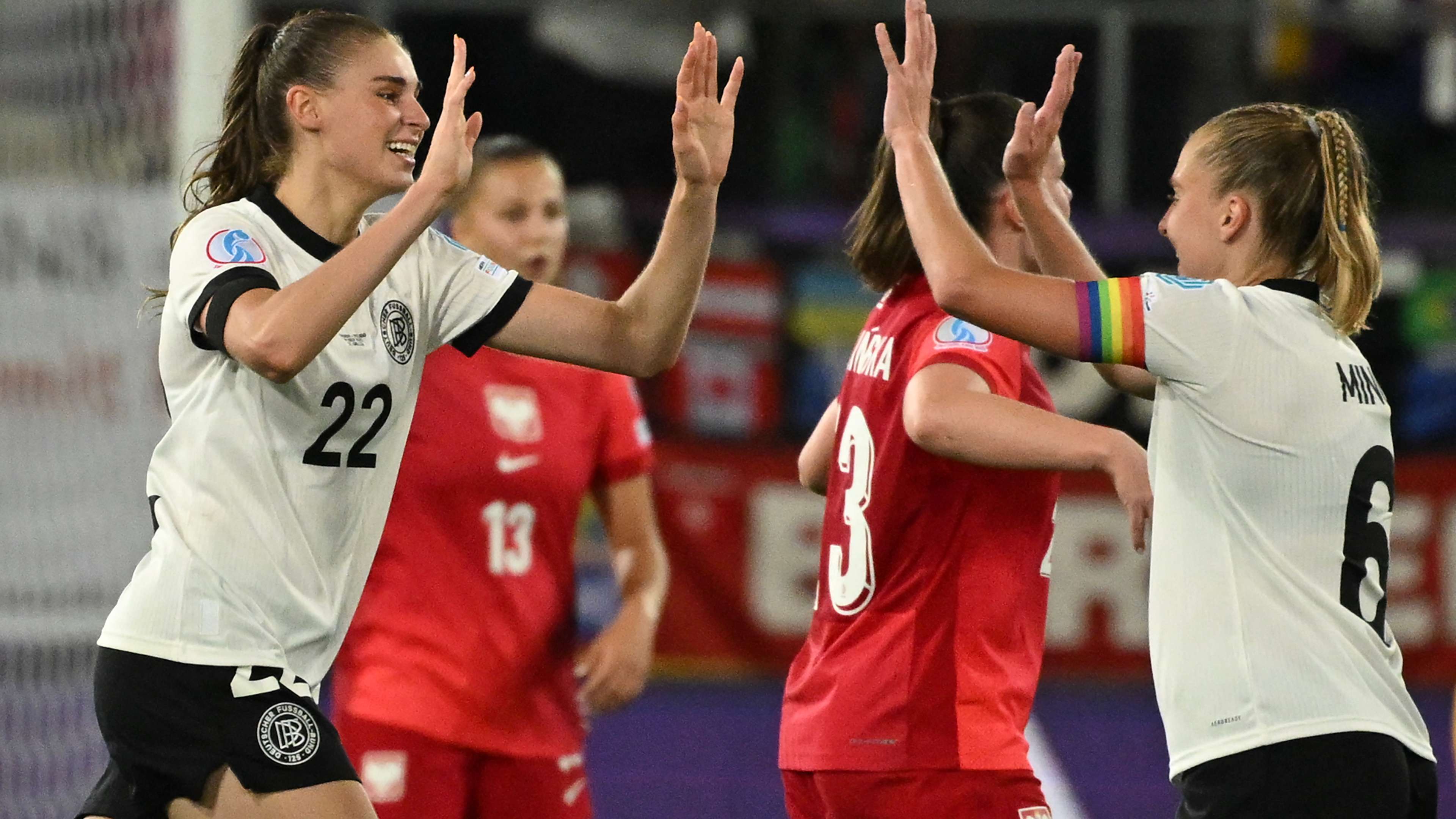 Brand leads Germany past Poland as Gwinn leaves game in tears  