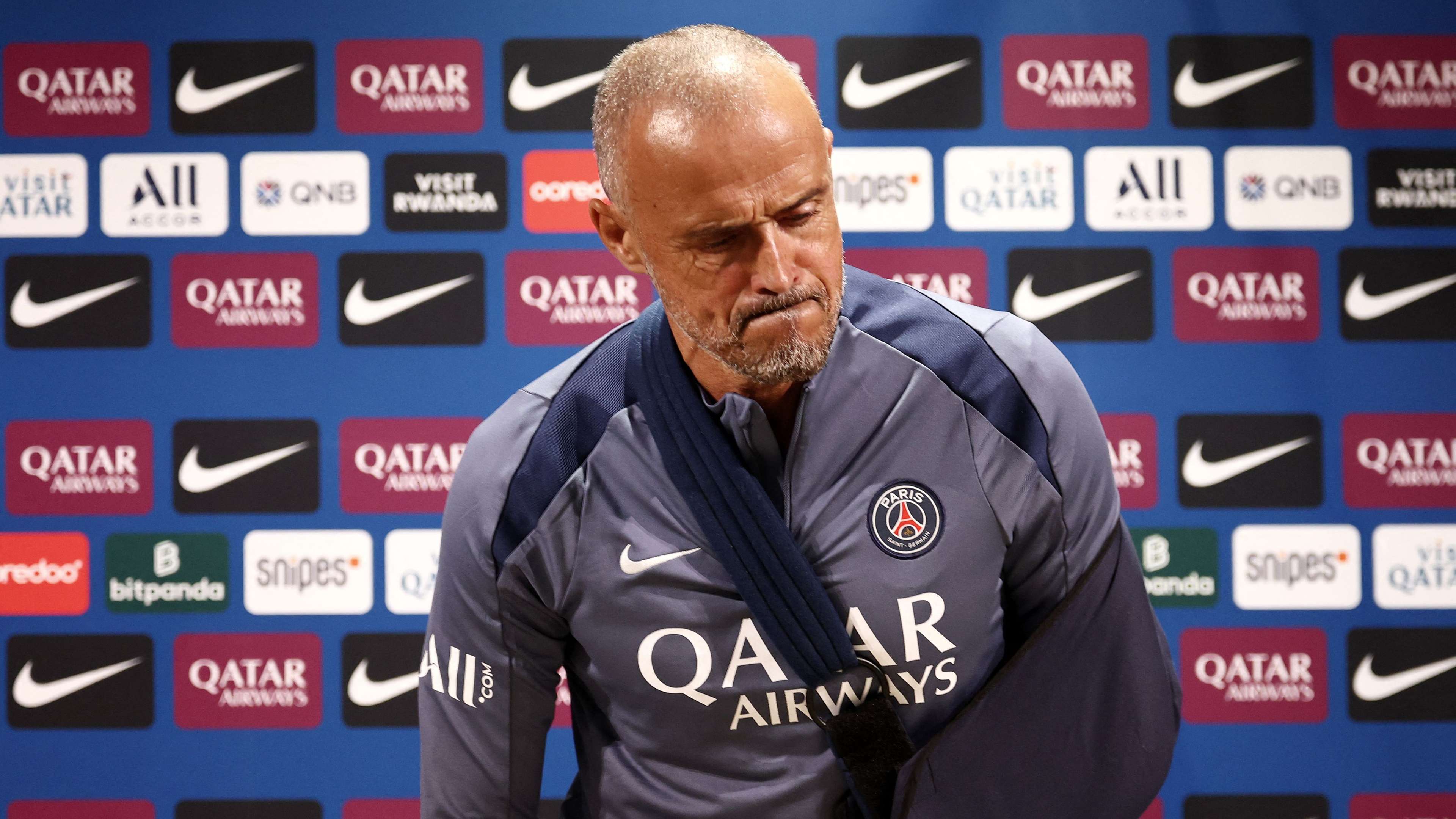 Luis Enrique sports new look after surgery on shoulder  