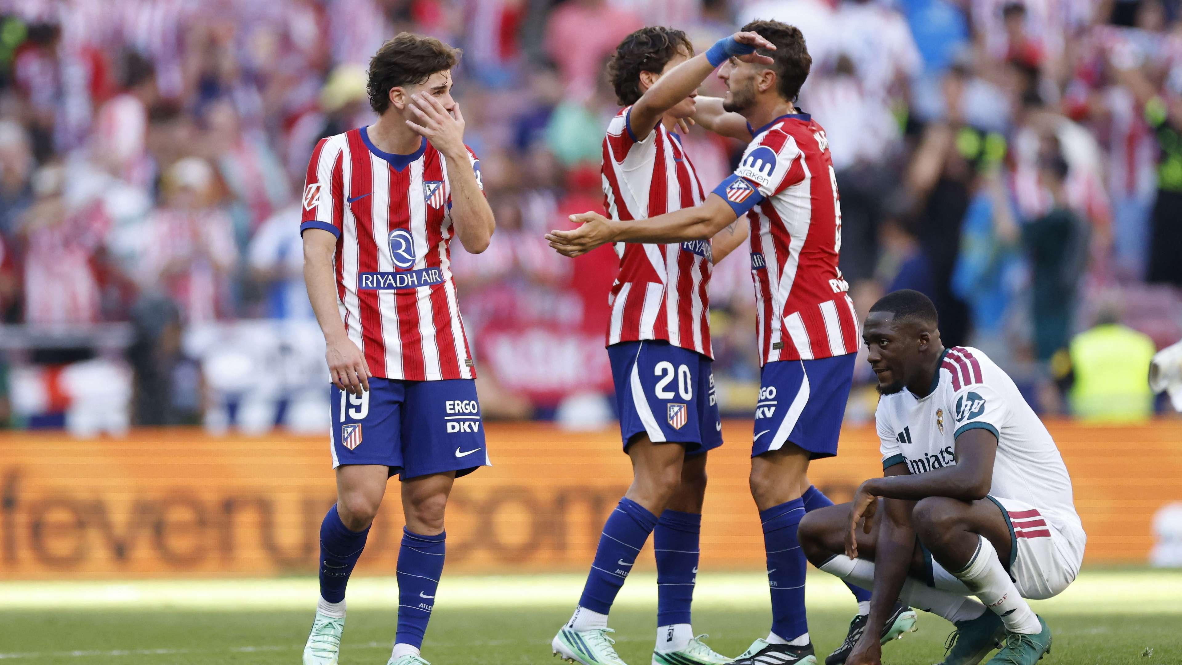 Atleti dominate fiery derby as Madrid crash  