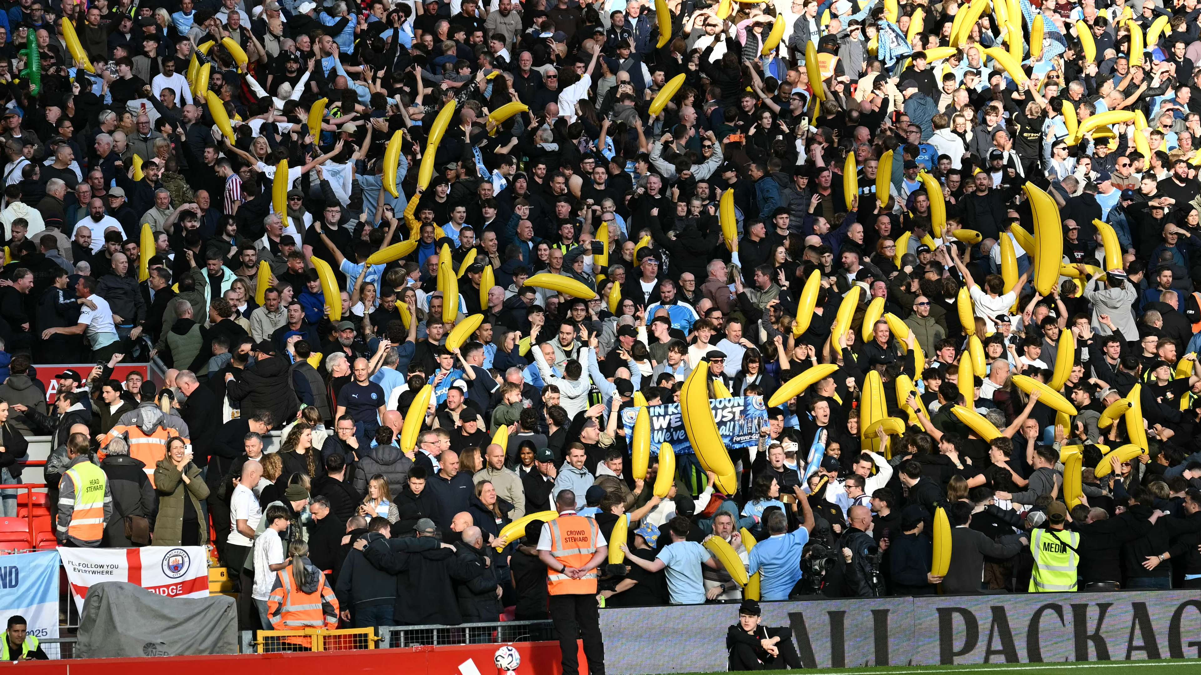 City fans suddenly pull out giant bananas in Liverpool  